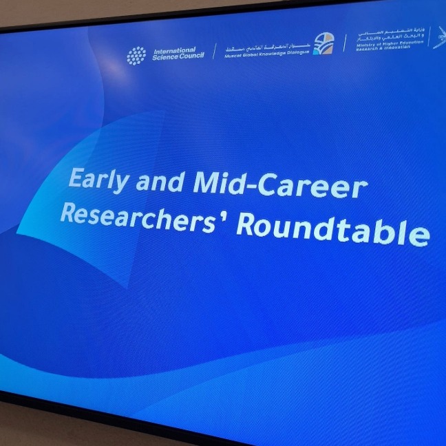 Projector screen showing the 'Early career researchers roundtable' session.