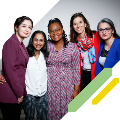 Group of five UK Young Academy members smile at the camera