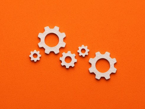 Lots of different wooden cogs coming together