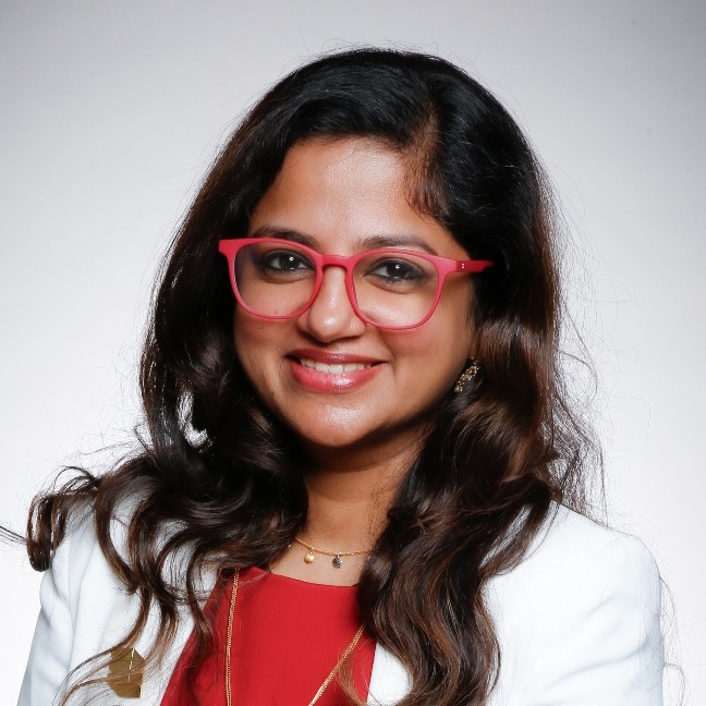 Nikita smiles at the camera